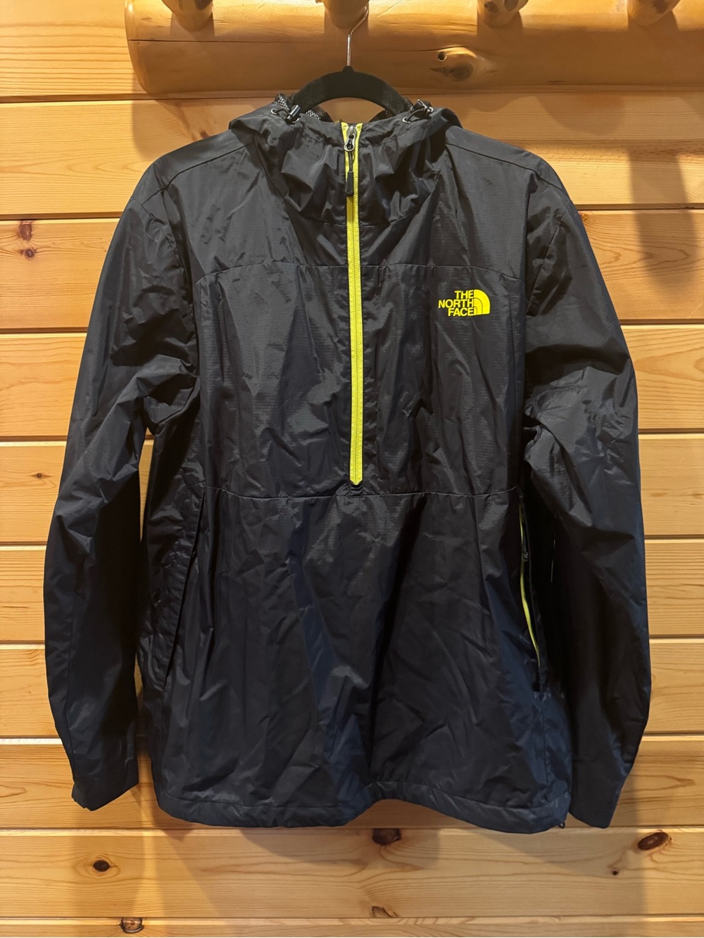 The North Face Unisex Black Rain Anorak with Yellow Accents